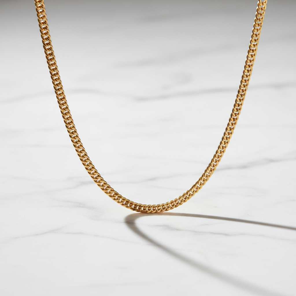 Gold Chain on White Marble